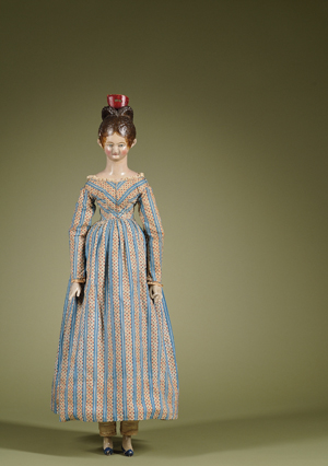 Important portrait-type carved-wood doll, Germany, circa 1820, 39 inches. Richard Wright is believed to have acquired the doll via private treaty sale through Sotheby's London in the 1980s. Undocumented anecdotal history purports that the doll was commissioned by a member of the Dutch Royal Family. Estimate $40,000-$60,000. Image courtesy Skinner Inc.